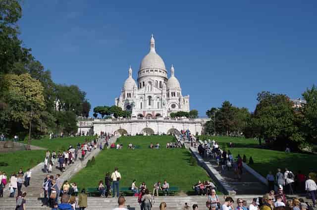  Montmartre is one of the top places to visit in Paris for the artistic history and the white-domed basilica.